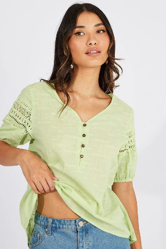 women's tops for those who want to add a bit of flair and personality to their looksGreen Top lace details sleeve texture cotton